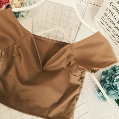 Bluză de damă simplă, cu decolteu în V, potrivită pentru utilizarea de zi cu zi