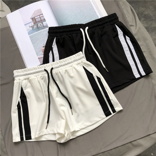 Pantaloni scurti sport de damă alb-negru