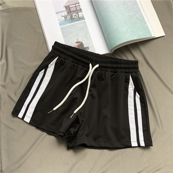 Pantaloni scurti sport de damă alb-negru