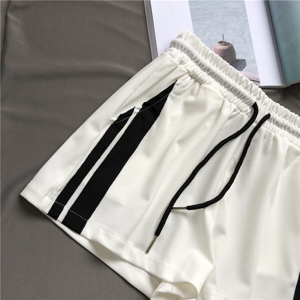 Pantaloni scurti sport de damă alb-negru