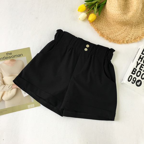 Pantaloni curați de damă cu talie înaltă și elemente cu nasturi