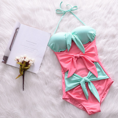 Un costum de baie intreg de dama cu panglici si bretele subtiri din doua piese