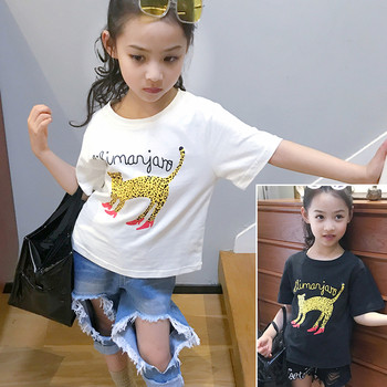 Памучна детска тениска за момиче с щампа в бял и черен цвят