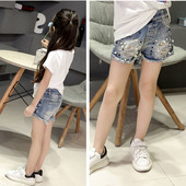 Παιδικά παντελόνια  denim με σκισμένα μοτίβα και  με μταλλική διακόσμηση