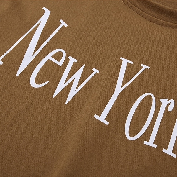 Tricou din bumbac pentru copii pentru o fată cu inscripție în alb și maro