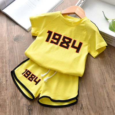 Παιδική αθλητική φόρμα σε δύο χρώματα με επιγραφή