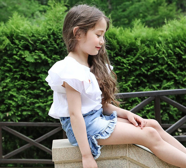 Καλοκαιρινό λευκό πουκάμισο για κορίτσια με κεντήματα