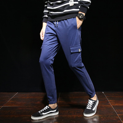 Ανδρικά αθλητικά παντελόνια με πλευρικές τσέπες σε διάφορα χρώματα