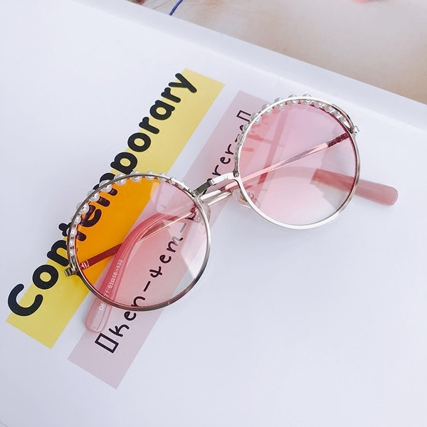 Γυναικεία γυαλιά ηλίου ενδιαφέροντος σχήματος