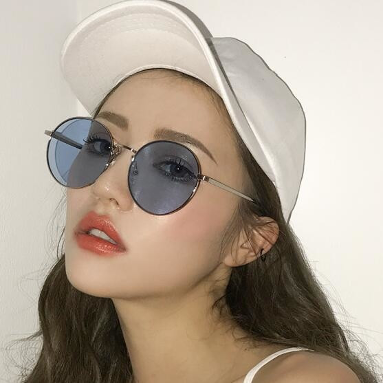 Női napszemüveg átlátszó lencsékkel - két színben