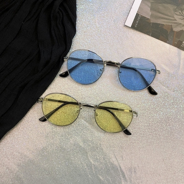 Női napszemüveg átlátszó lencsékkel - két színben