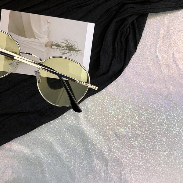 Női napszemüveg átlátszó lencsékkel - két színben