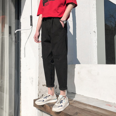 Pantaloni barbatesti cu motive rupte in mai multe culori