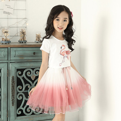 Modern children`s set for girls including - T-shirt with flamingo applique and seal skirt - two colors