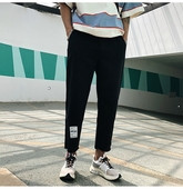 Παντελόνια ανδρικά με τυπωμένα και σκισμένα μοτίβα σε μαύρο και μπεζ χρώμα