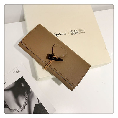 Μακρύ γυναικείο πορτοφόλι με τρισδιάστατη διακόσμηση