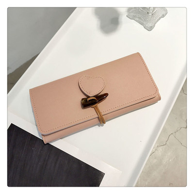 Μακρύ γυναικείο πορτοφόλι με τρισδιάστατη διακόσμηση