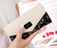 Μοντέρνο χαρτοφυλάκιο γυναικών με επιγραφή και φυτικά μοτίβα σε διάφορα χρώματα