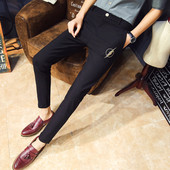 Κομψά μαύρα παντελόνια ανδρών με κεντήματα