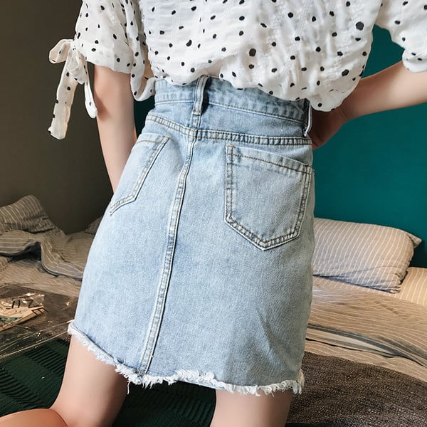 Fusta denim asimetrica de culoare deschisa