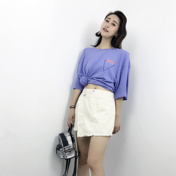 Παντελόνια με ασύμμετρη κοπή σε λευκό