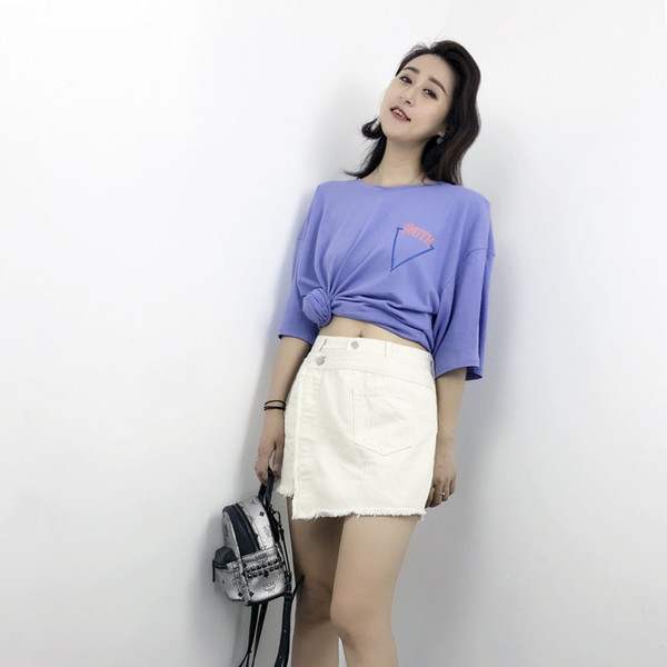 Παντελόνια με ασύμμετρη κοπή σε λευκό