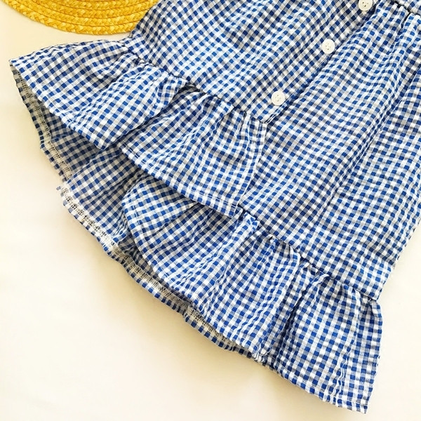 Fusta scurta in carouri pentru copii pentru o fata cu talie inalta si volane