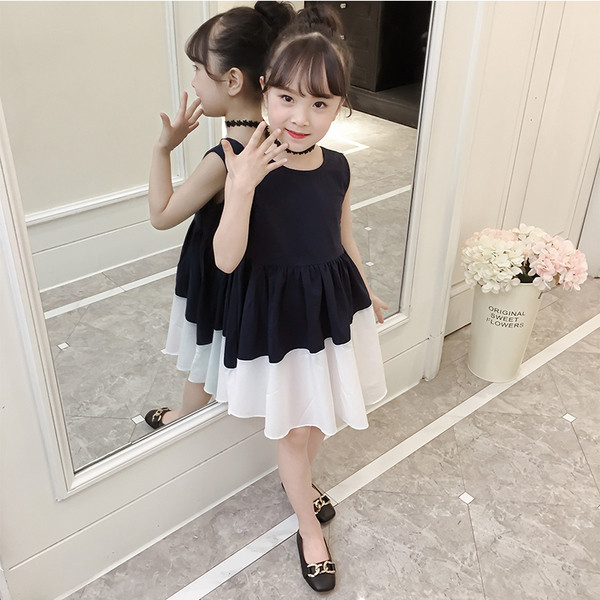 Rochie modernă pentru copii alb-negru, cu panglică și spate deschis