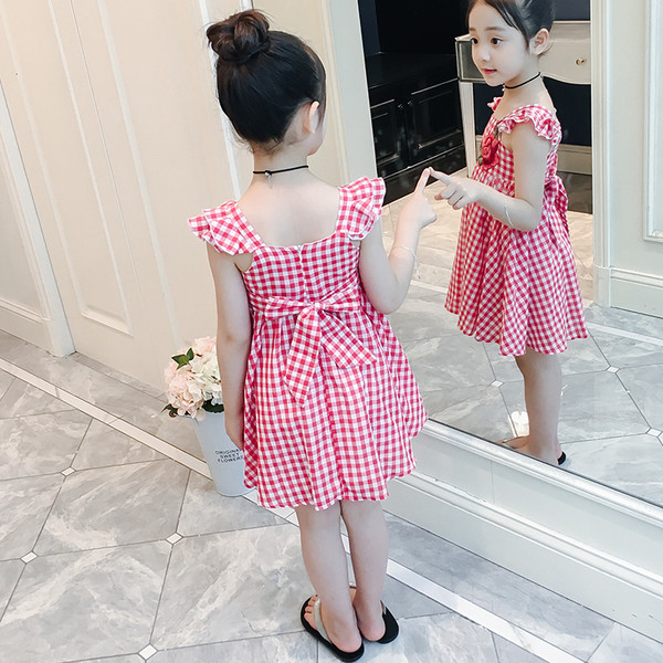 Rochie pentru copii in carouri in rosu cu broderie florala si panglica