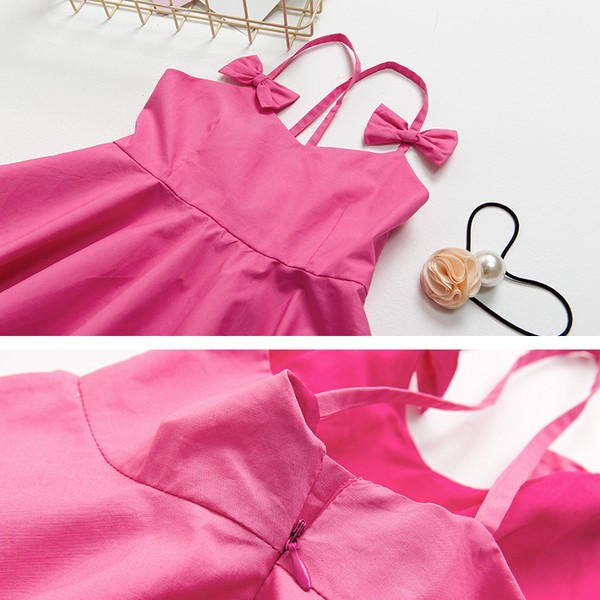 Rochie casual pentru copii cu bretele incrucisate si panglici in alb si roz