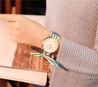 Γυναικείο ρολόι με ενδιαφέρον κορδόνι σε στρογγυλό σχήμα - διαφορετικά χρώματα