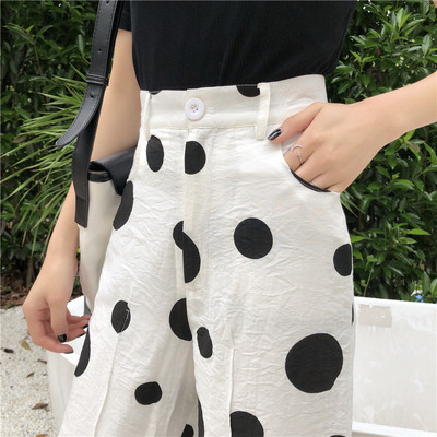 Μοντέρνα λευκά παντελόνια με κουκίδες και ψηλή μέση