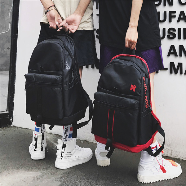 Μεγάλο δερμάτινο σακίδιο με επιγραφή - διάφορα χρώματα