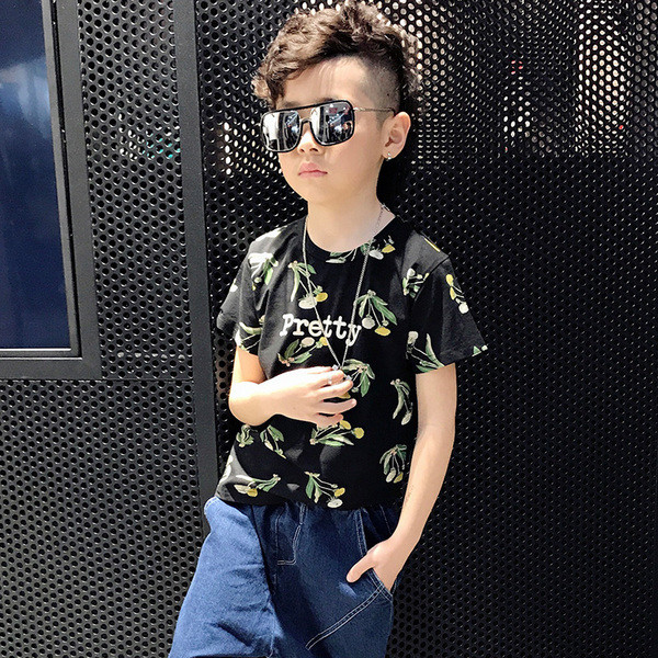 Gyerek póló virágos motívumokkal, fehér és fekete színű felirattal fiúnak és lánynak