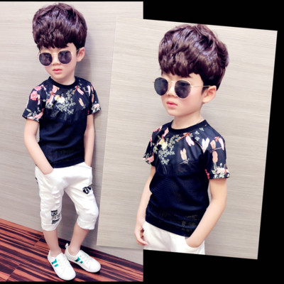 Модерна детска тениска за момче в черен цвят с мрежа и флорални мотиви