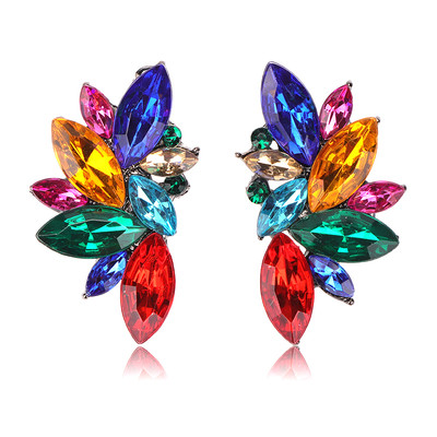 Stylish women`s earrings with decorative stones in four colors