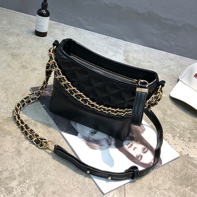 Geanta de dama cu maner lung si elemente metalice