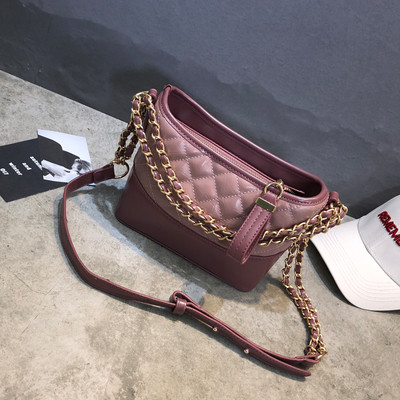 Geanta de dama cu maner lung si elemente metalice