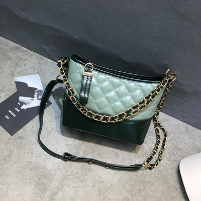 Geanta de dama cu maner lung si elemente metalice