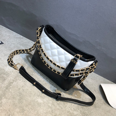 Geanta de dama cu maner lung si elemente metalice