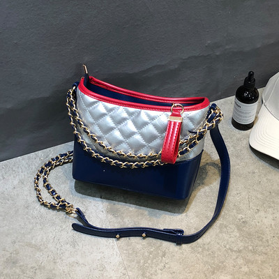 Geanta de dama cu maner lung si elemente metalice