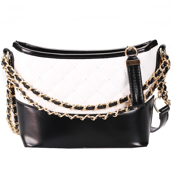 Geanta de dama cu maner lung si elemente metalice