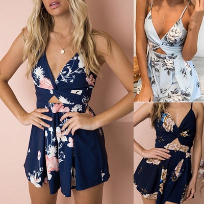 Modern women`s jumpsuit with V-neck with floral motifs in several colors