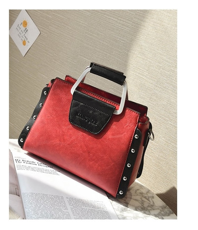 Κυρίες τσάντα πορτοφόλι με μεταλλικά καπάκια