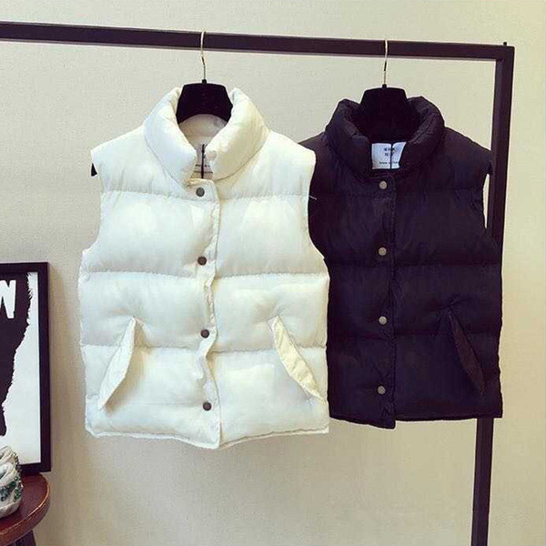 Γυναικείο χειμωνιάτικο γιλέκο σε μαύρο και άσπρο χρώμα