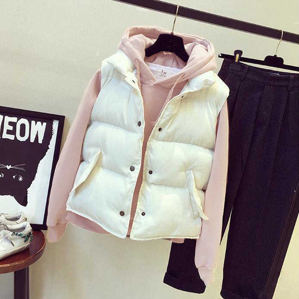 Γυναικείο χειμωνιάτικο γιλέκο σε μαύρο και άσπρο χρώμα