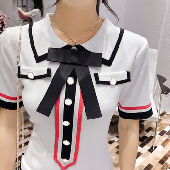 Стилна дамска рокля с интересна цветна апликация