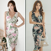 Модерна дамска рокля аси,етричен  модел с V-образно деколте и флорални мотиви