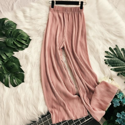 Modern women`s pants with a high waist in several colors - a wide model