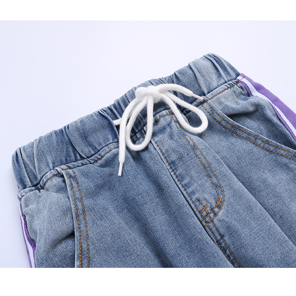 Дамски дънки с еластична талия и разкъсани мотиви в два модела